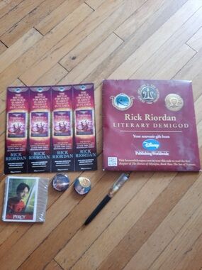 Percy Jackson trading cards and pins